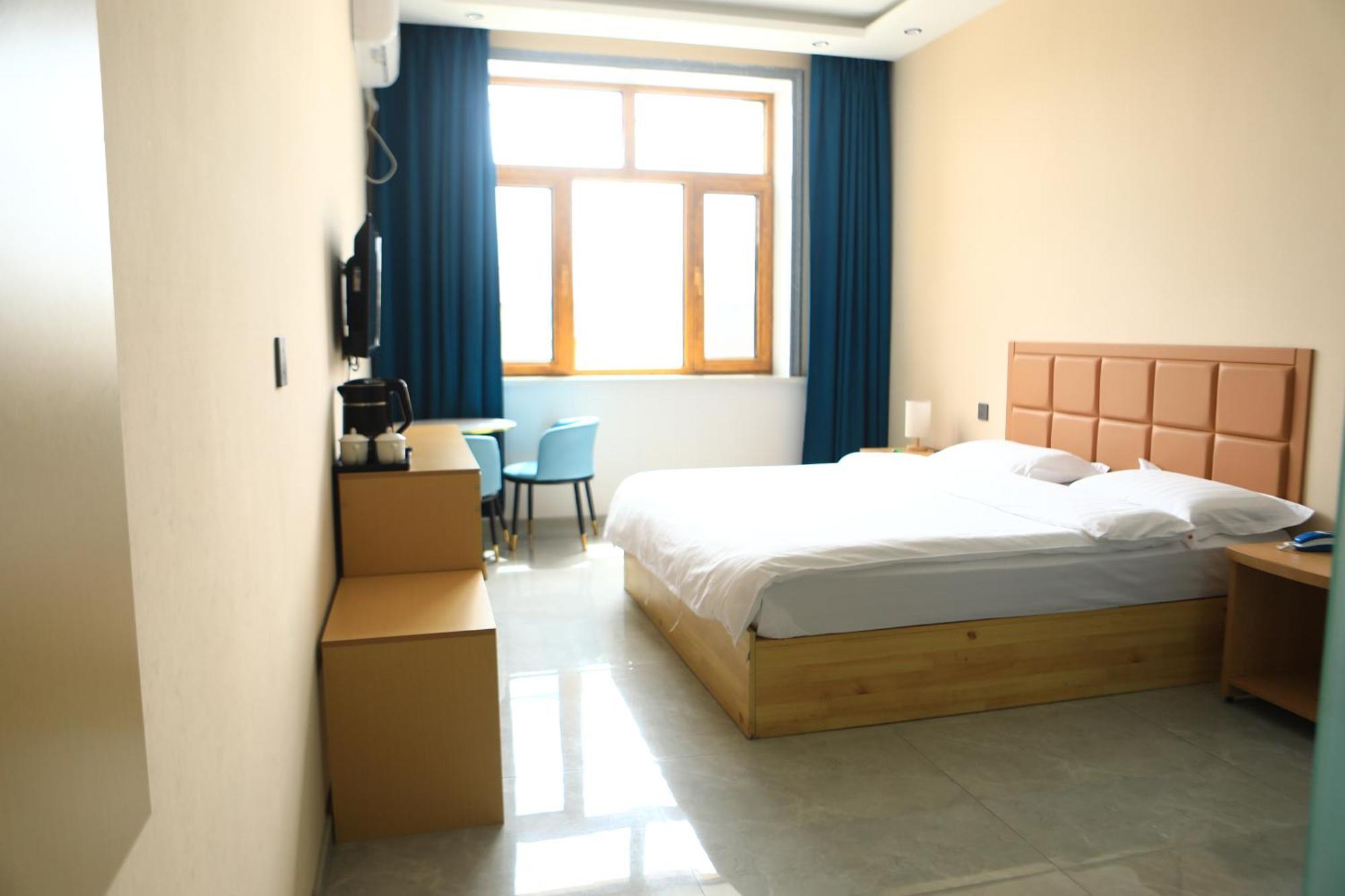 Hongge Hotel - Harbin Taiping Airport Екстер'єр фото