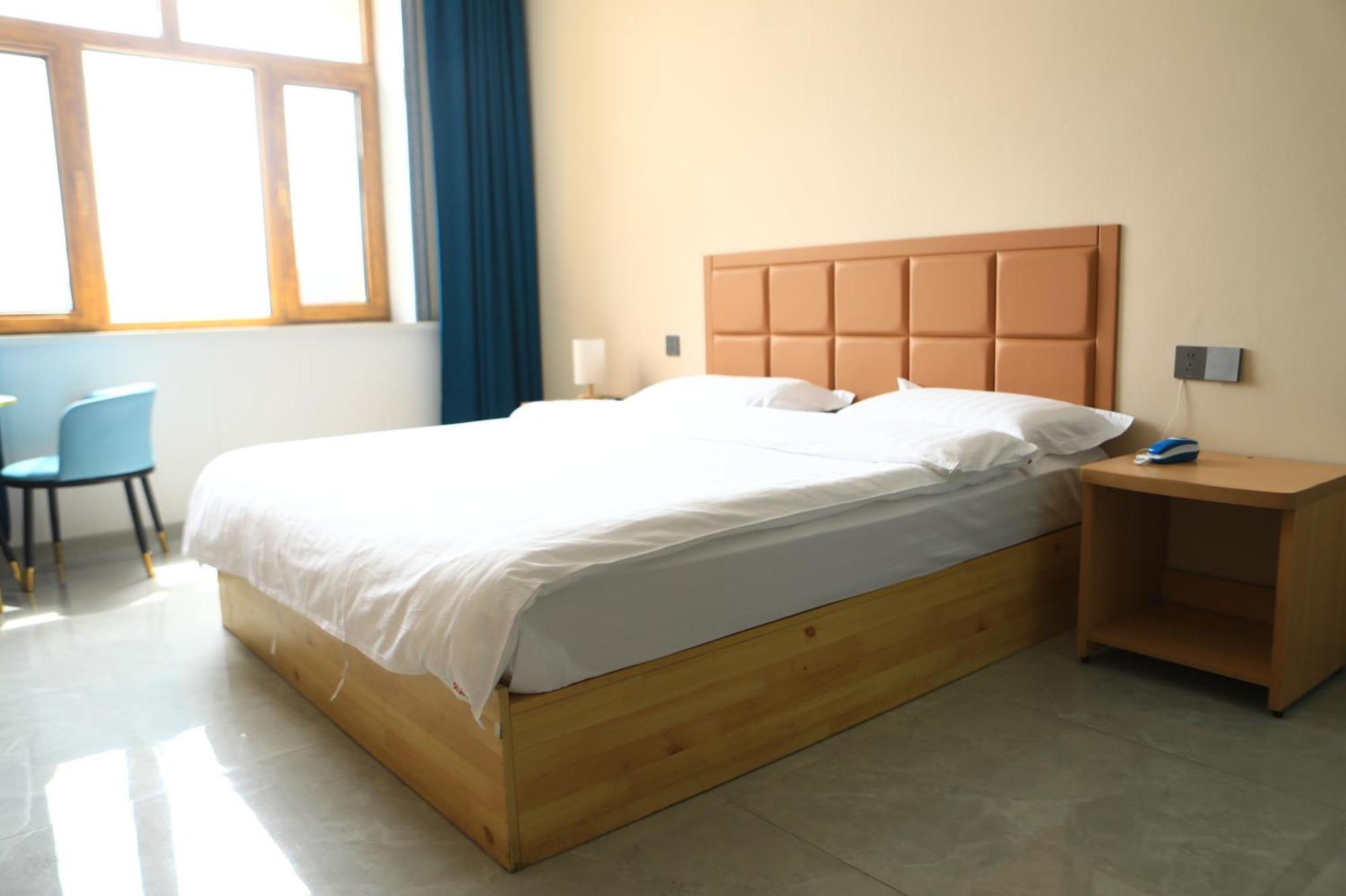 Hongge Hotel - Harbin Taiping Airport Екстер'єр фото